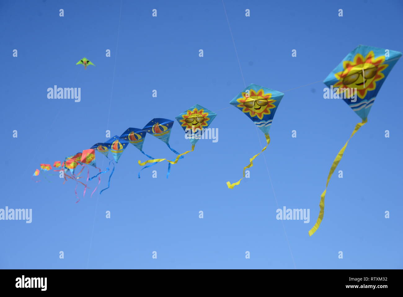 Participant flying colorful kites on the Kite Festival event in Coxs Bazar beach in Bangladesh