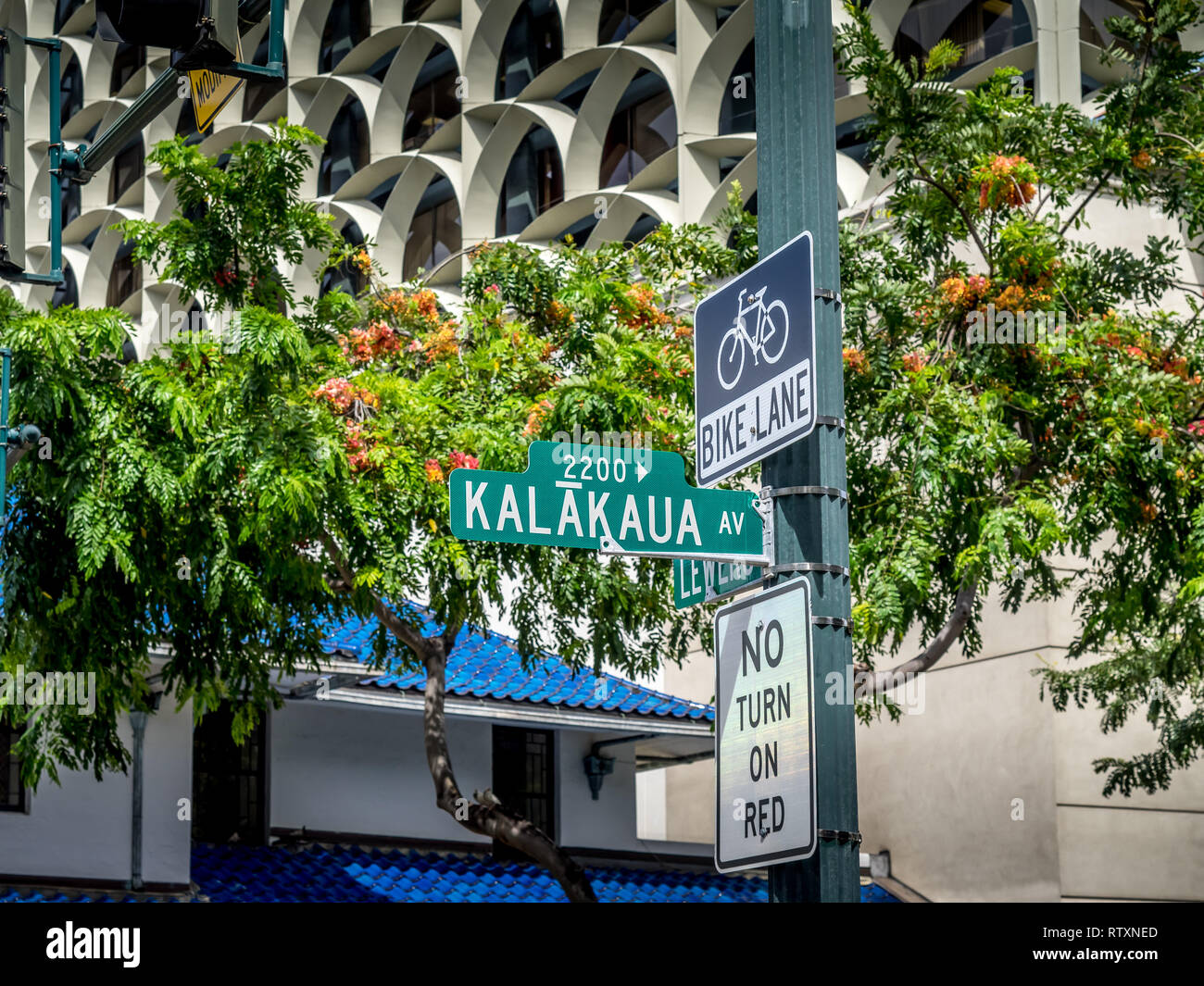 Kalakaua Avenue road sign. Kalakaua Avenue is the famous shopping strip