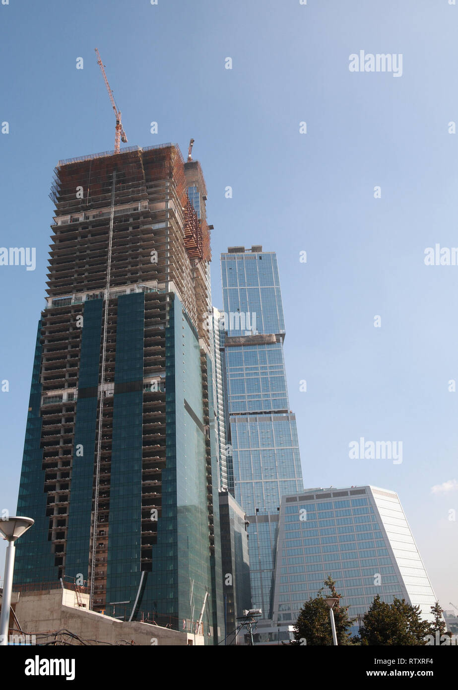 skyscraper develop on sky background Stock Photo - Alamy