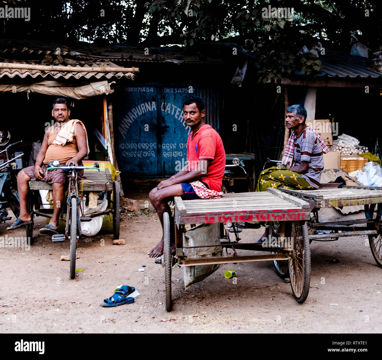 Three Rickshaw Pullers Taking A Break Form Work At Sahid Nagar Hata ...