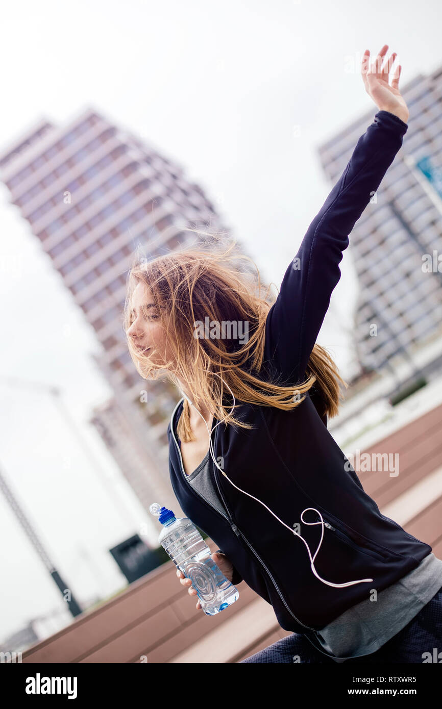 Woman arms up winner outdoors hi-res stock photography and images - Alamy