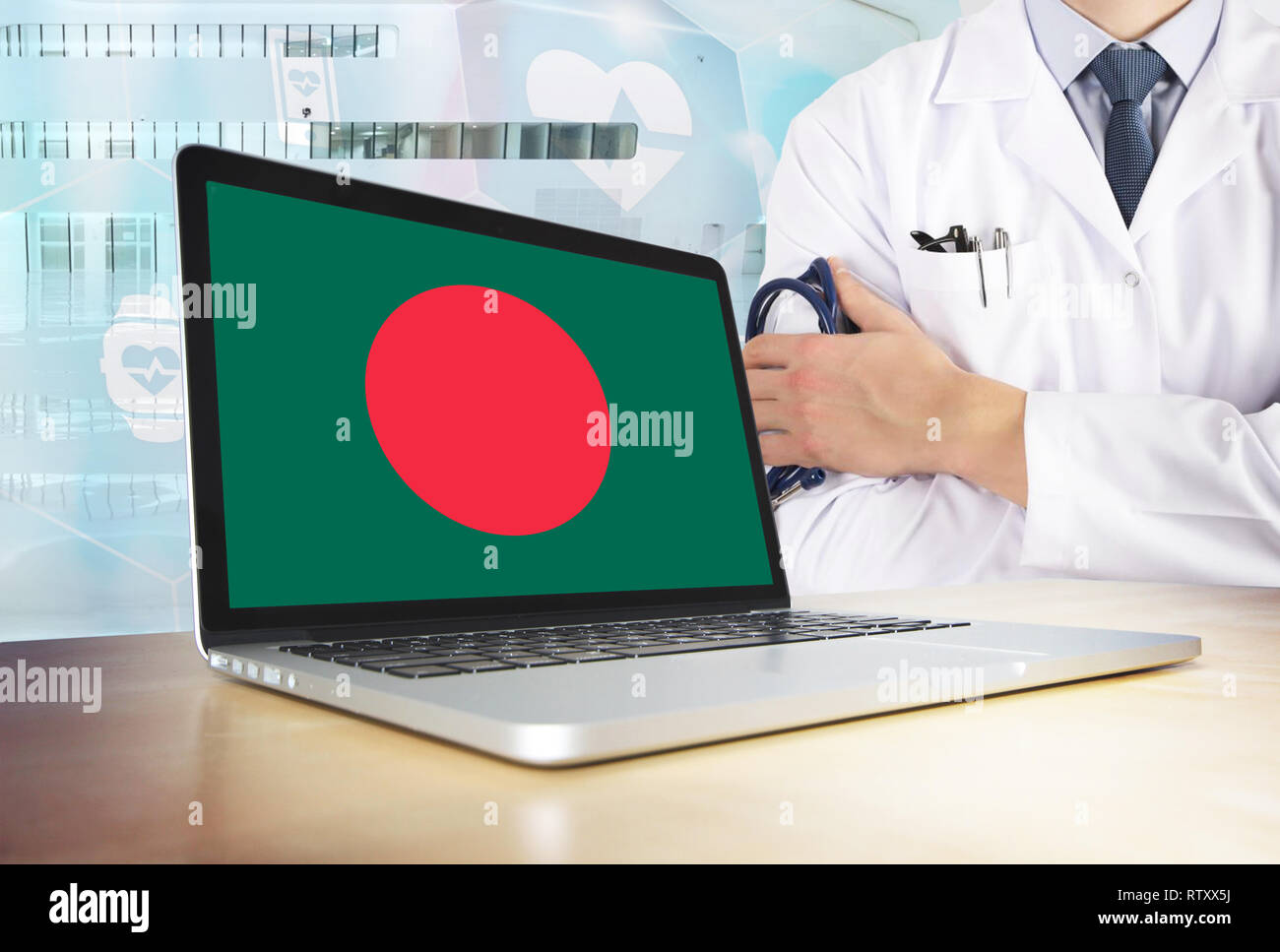 Bangladesh healthcare system in tech theme. Bangladeshi flag on computer screen. Doctor standing