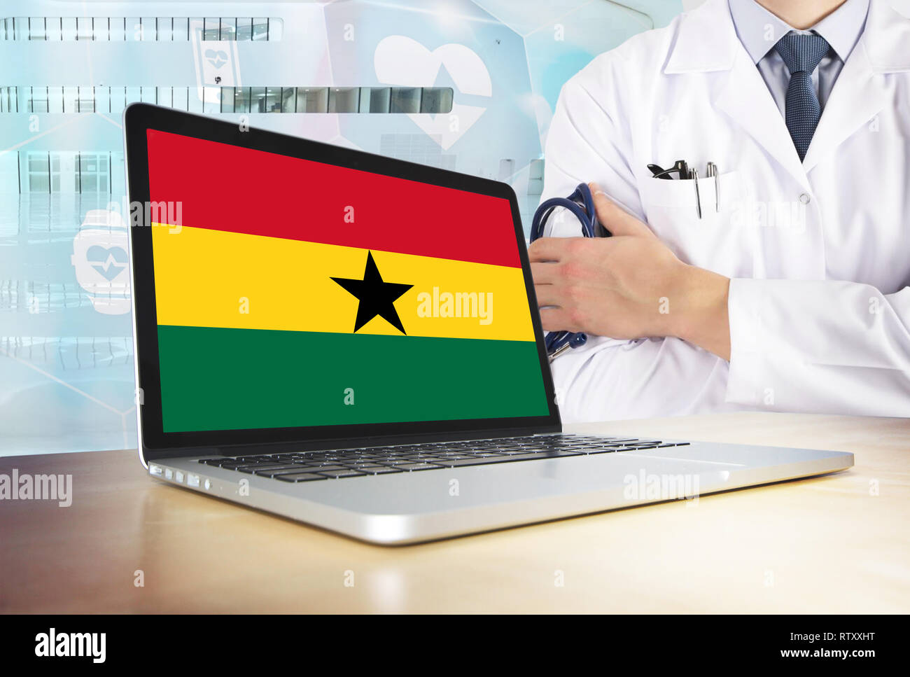 Ghana healthcare system in tech theme. Ghanaian flag on computer screen