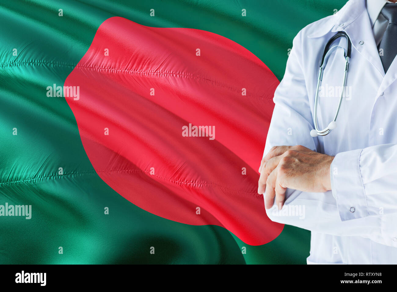 Doctor standing with stethoscope on Bangladesh flag background. National healthcare system concept, medical theme. Stock Photo