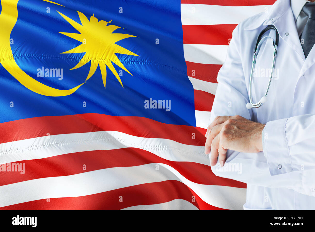 Malaysian Doctor Standing With Stethoscope On Malaysia Flag Background National Healthcare System Concept Medical Theme Stock Photo Alamy