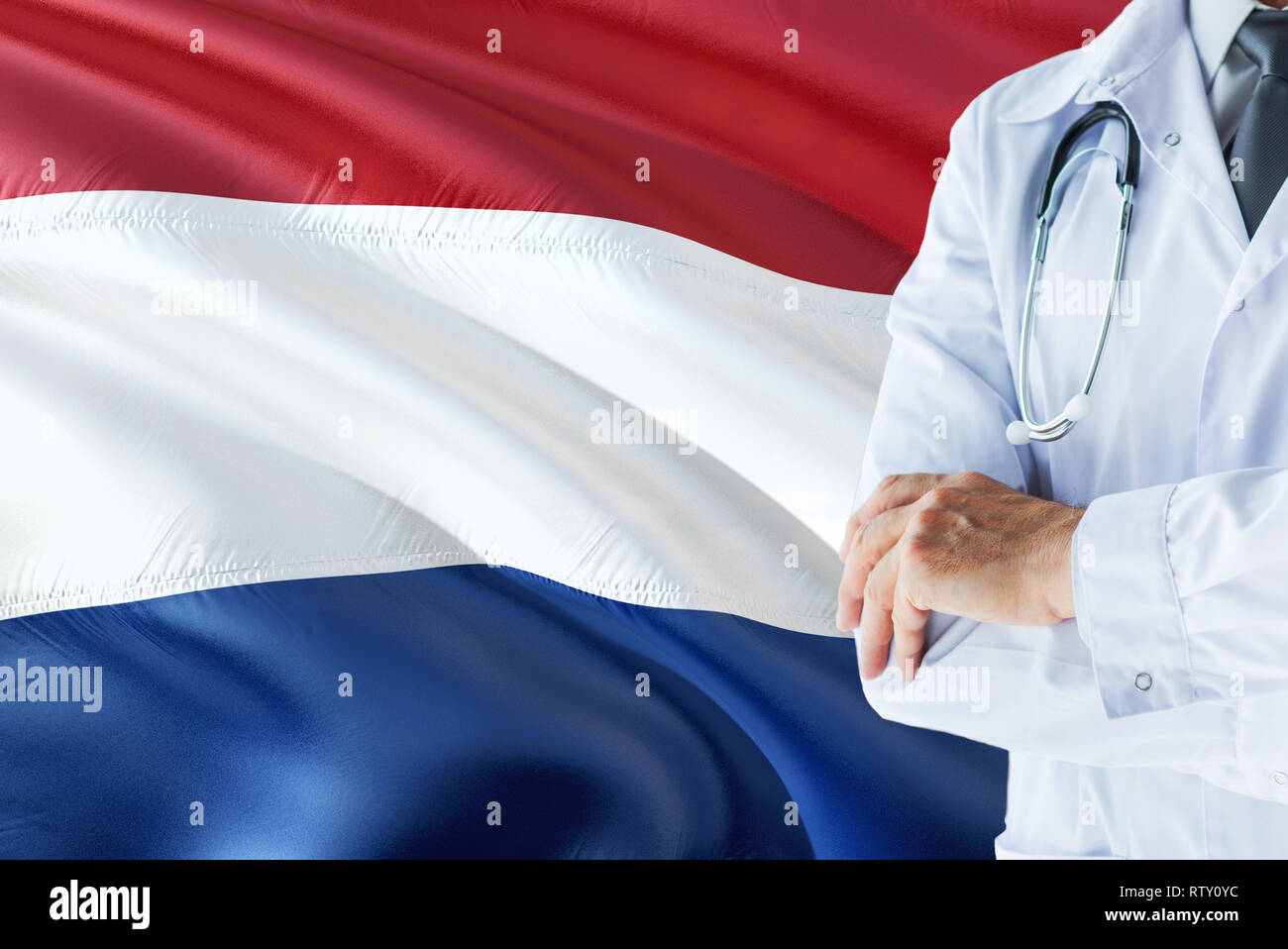Dutch Doctor standing with stethoscope on Netherlands flag background