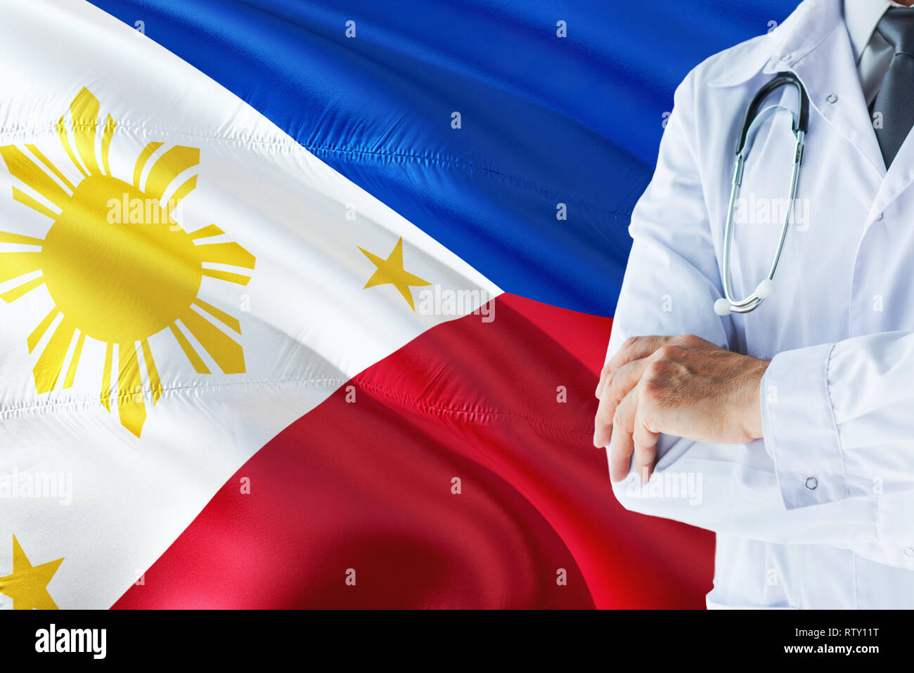 Filipino Doctor standing with stethoscope on Philippines flag