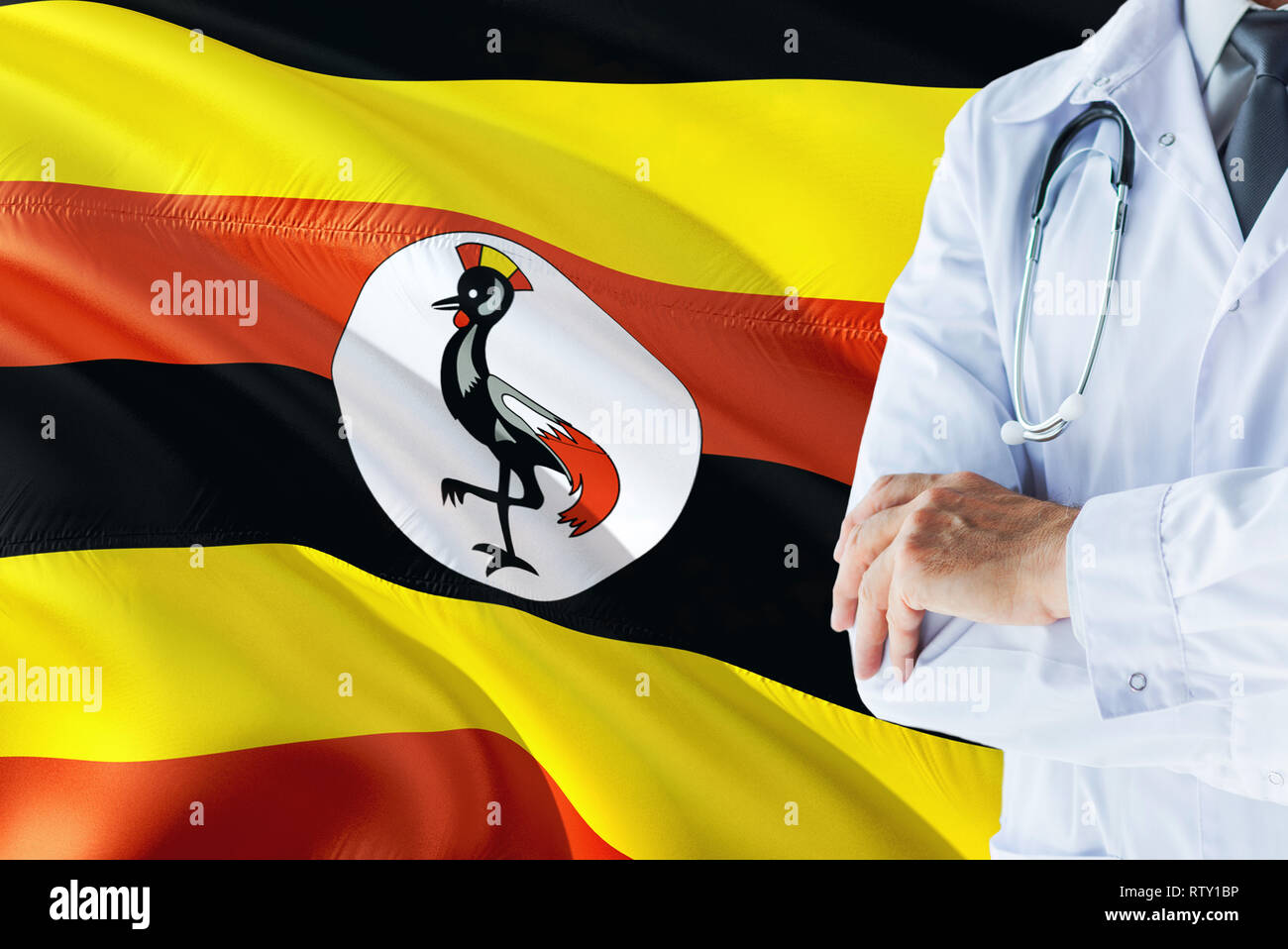 Ugandan Doctor standing with stethoscope on Uganda flag background