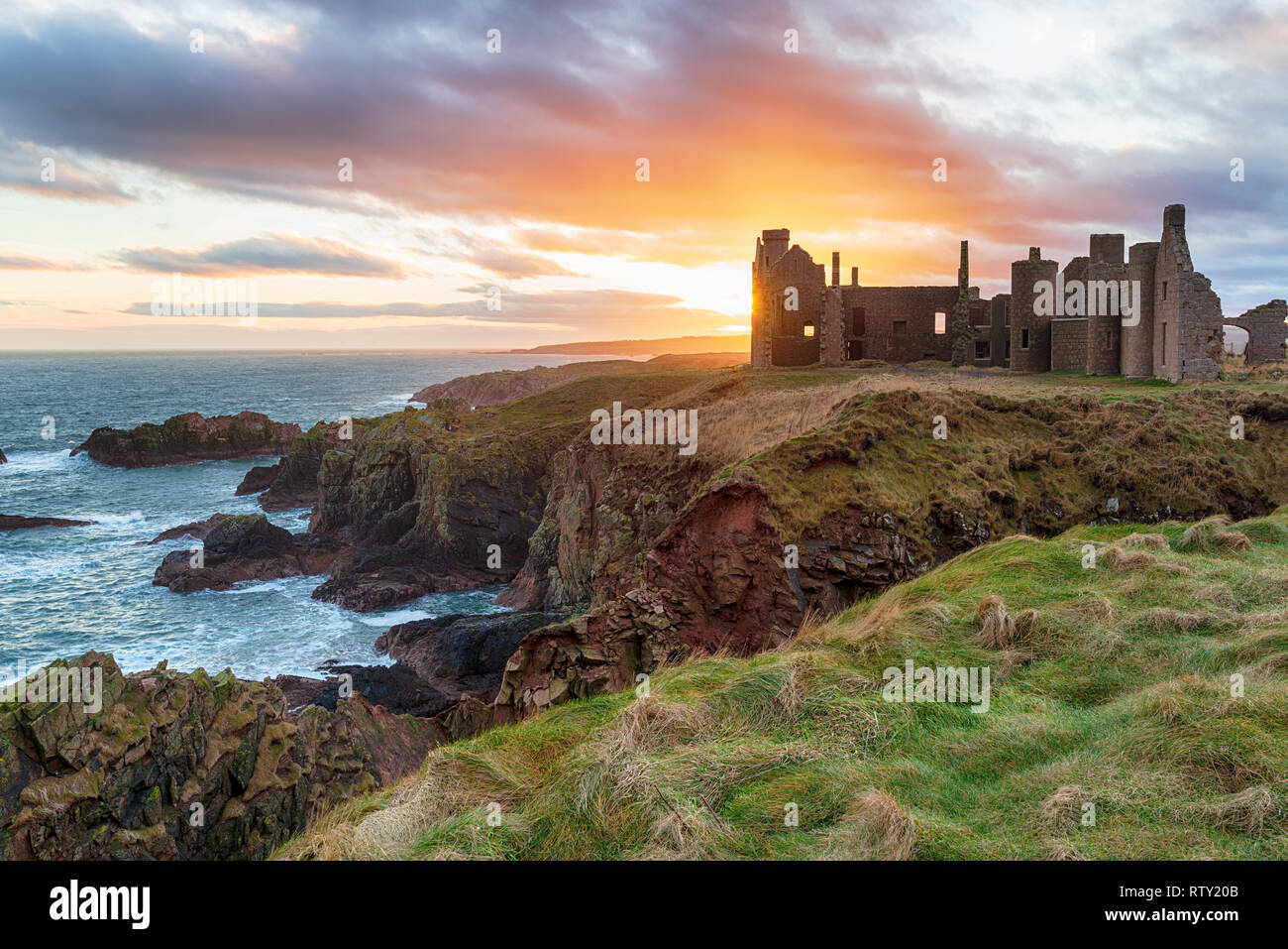 Stunning sunset over Slains Castle near Peterhead on the east coast of