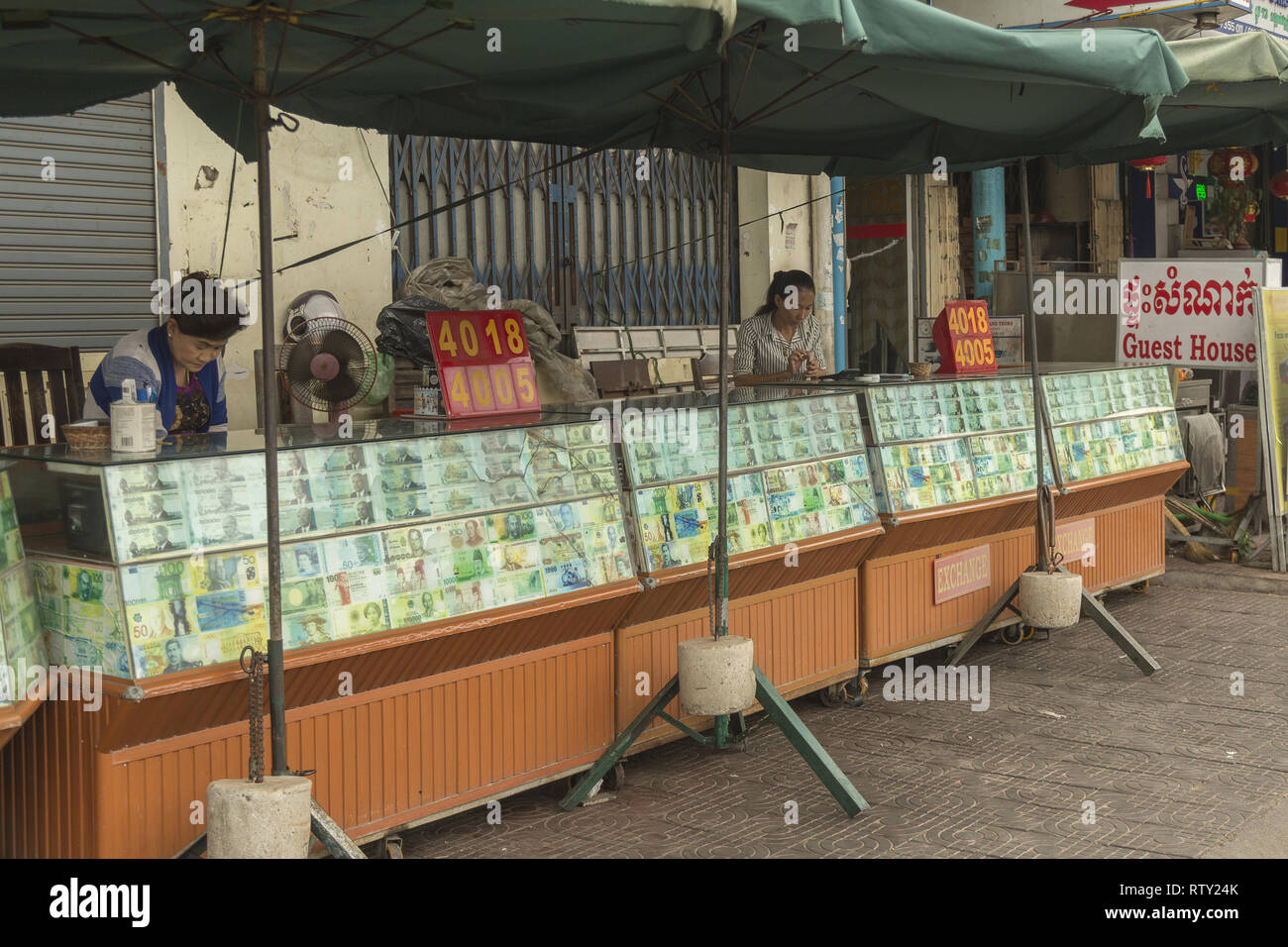 Money exchange stalls in Phnom Penh, Cambodia. Stock Photo