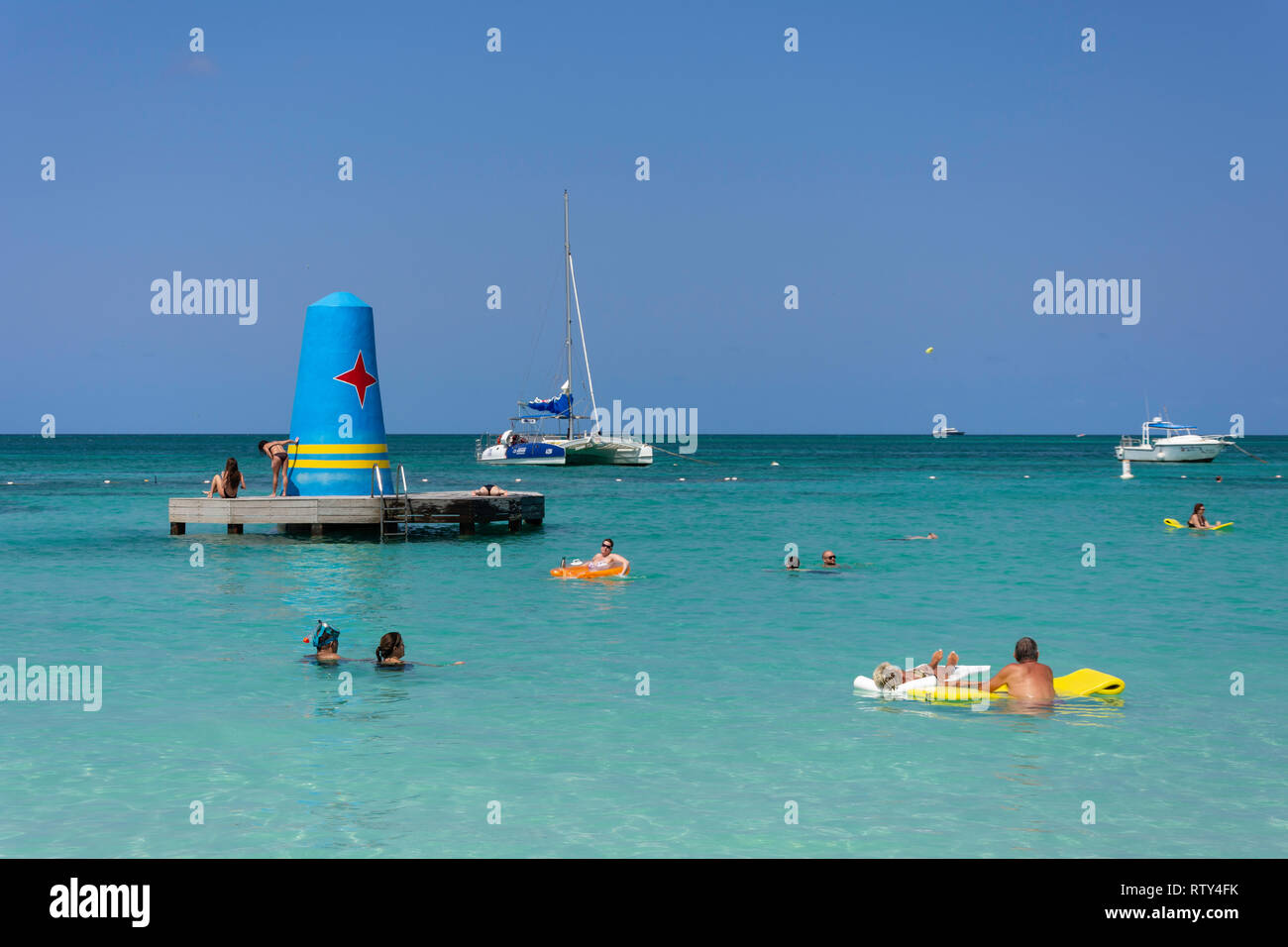 Group in sea, Palm Beach (Hotel Riu Palace), Noord District, Aruba, ABC Islands, Leeward Antilles, Caribbean Stock Photo