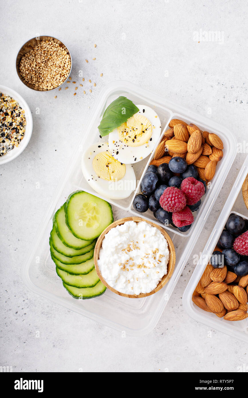 Lunch or snack box with high protein food, cottage cheese, nuts and eggs  Stock Photo - Alamy