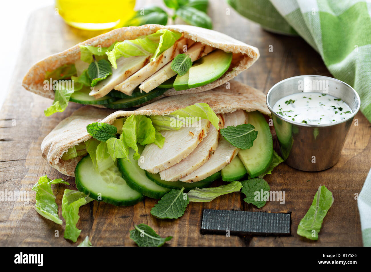 Healthy pita sandwich with chicken and green vegetables Stock Photo - Alamy