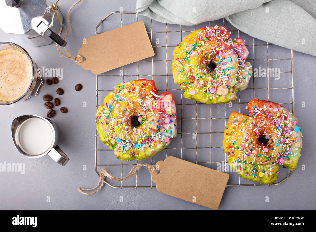Colorful And Festive Unicorn Donut With Sprinkles On A Baking Rack
