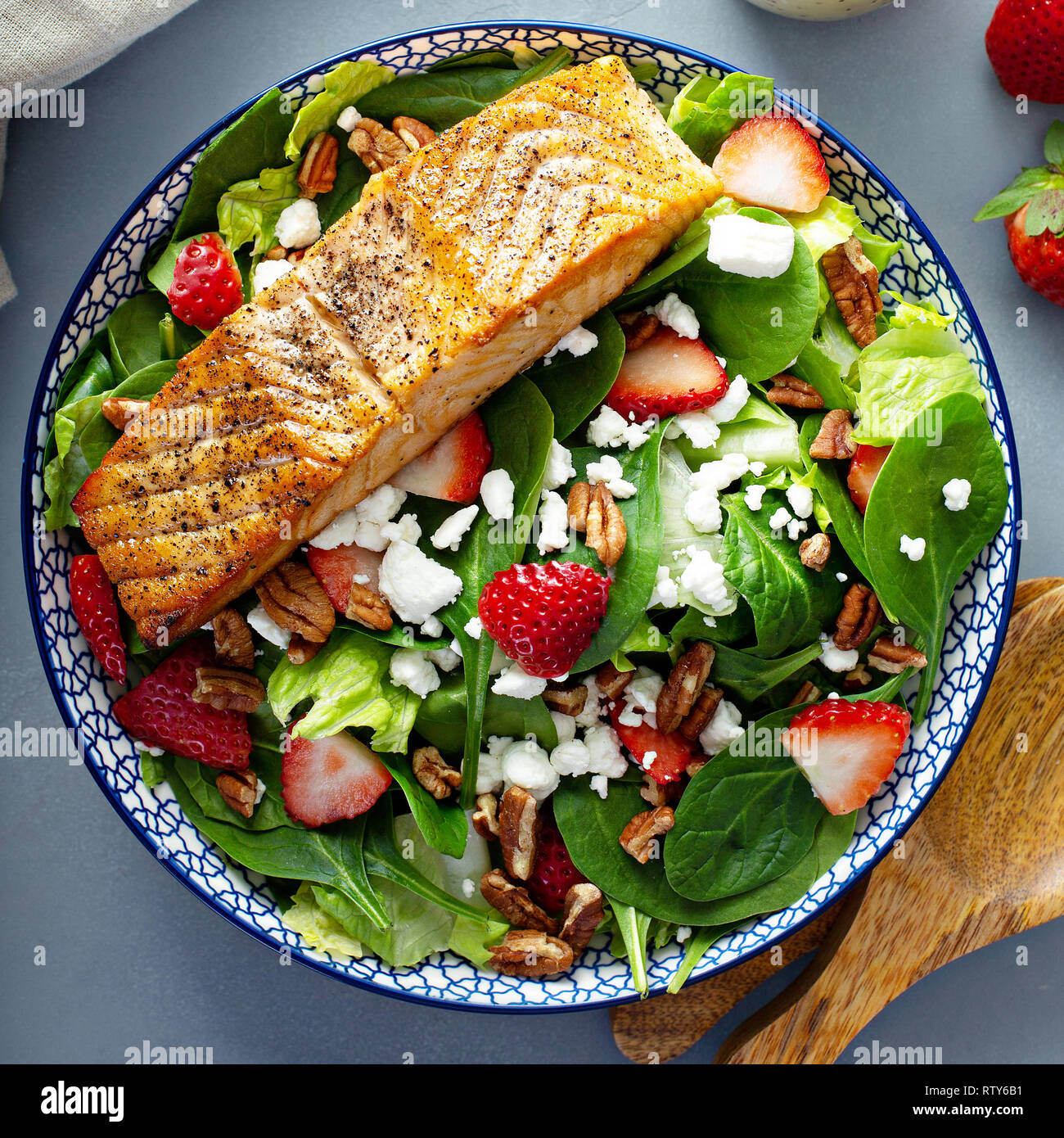 Fresh strawberries and goat cheese salad with grilled salmon Stock
