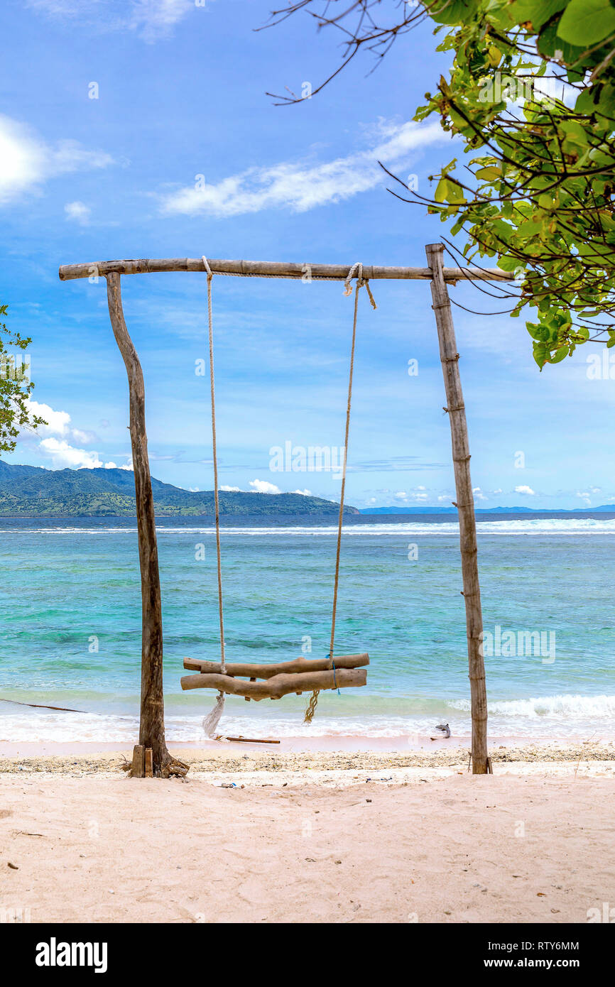 Indonesia will swing in the sea on the island of Gili Trawangan. Stock Photo