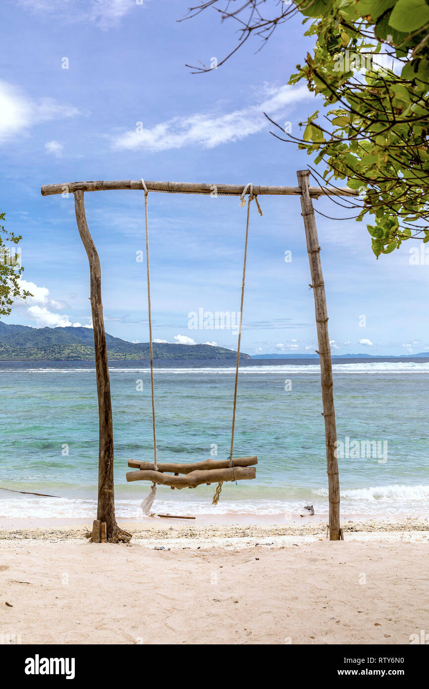 Indonesia will swing in the sea on the island of Gili Trawangan. Stock Photo