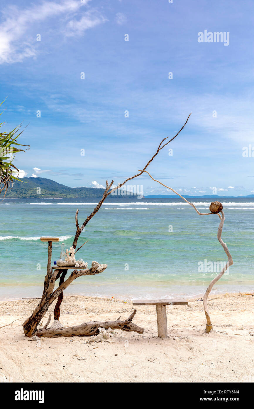 Ocean view and dry tree on the beach of Gili Trawangan, Indonesia. Stock Photo