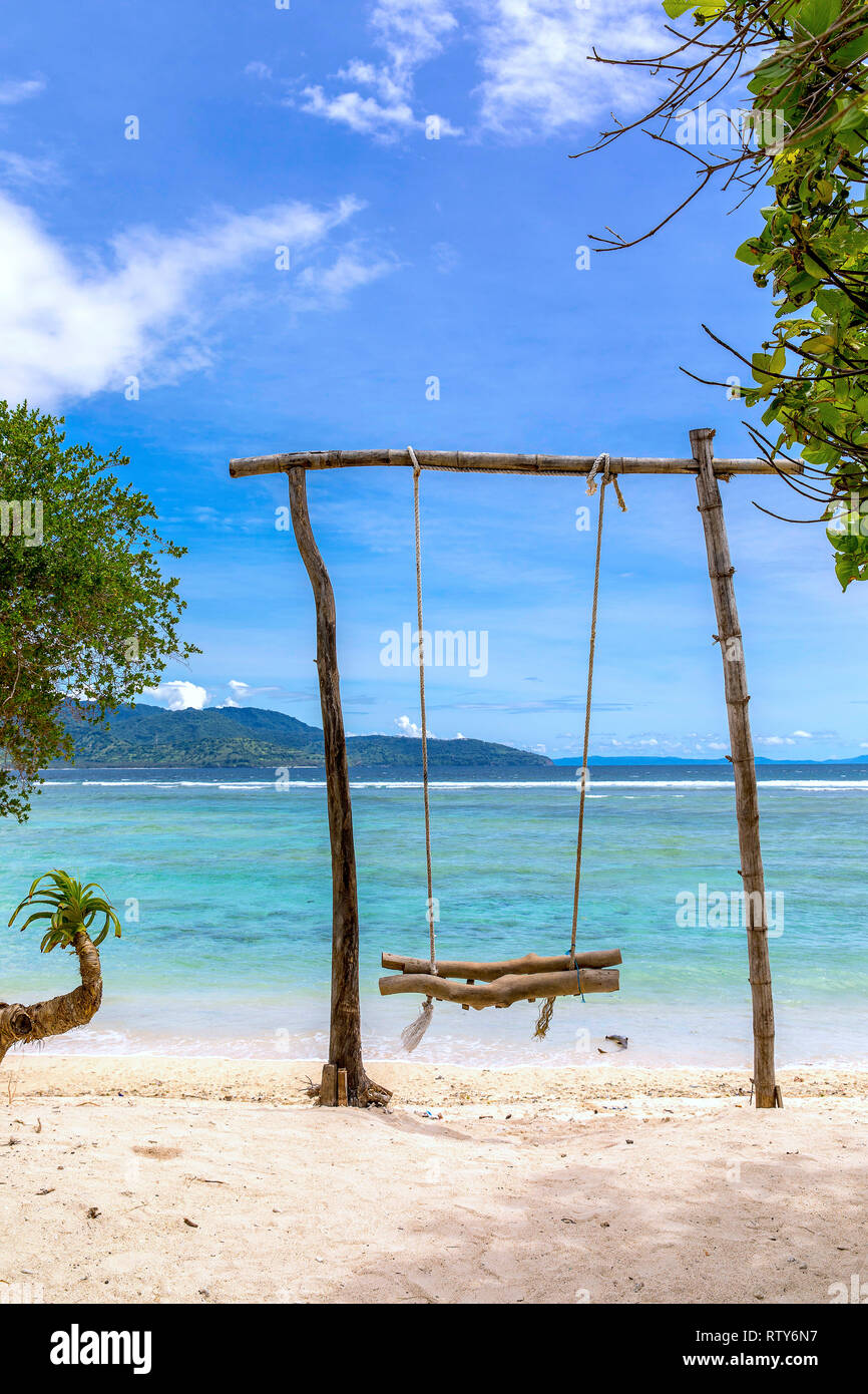 Indonesia will swing in the sea on the island of Gili Trawangan. Stock Photo