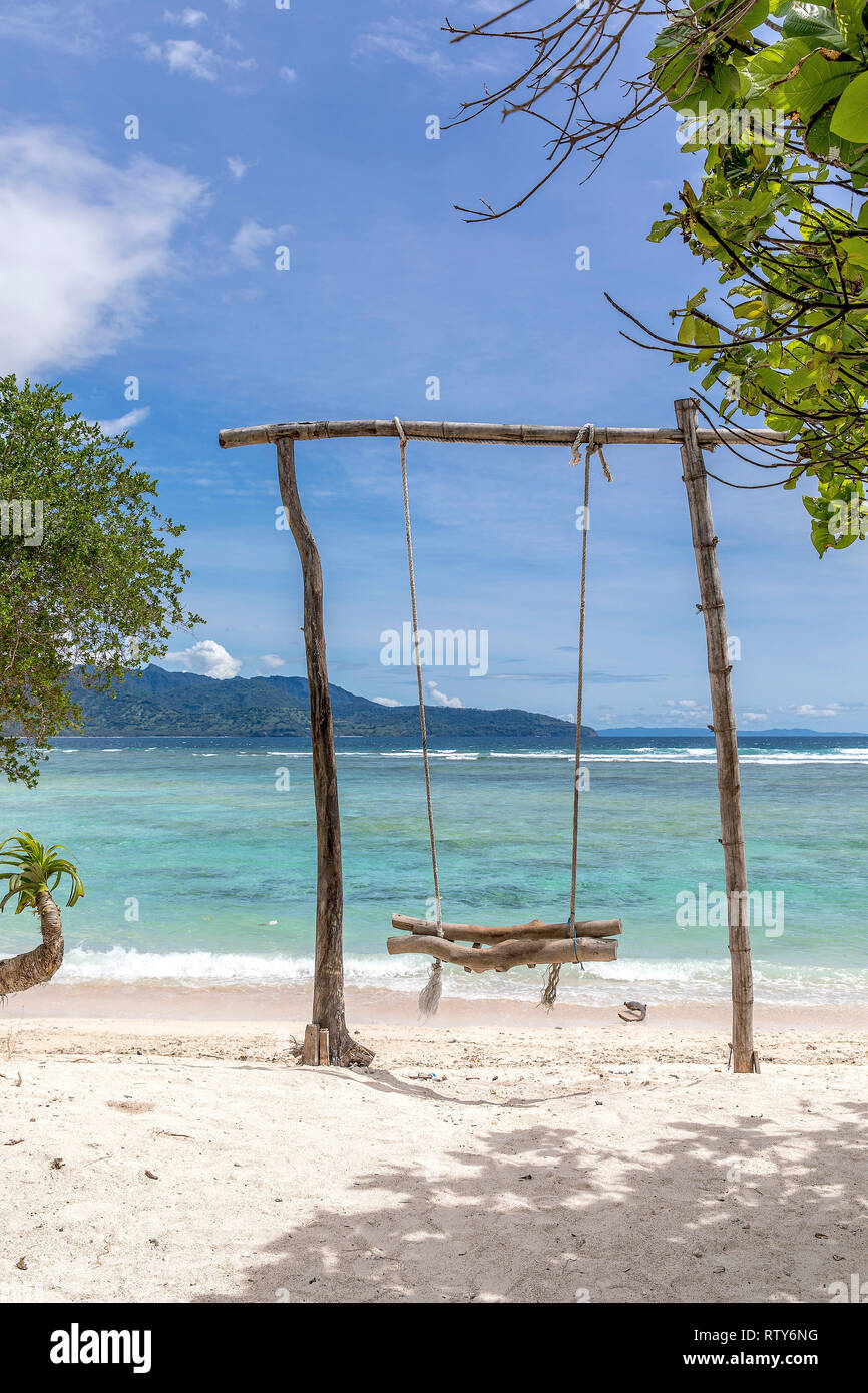 Indonesia will swing in the sea on the island of Gili Trawangan. Stock Photo