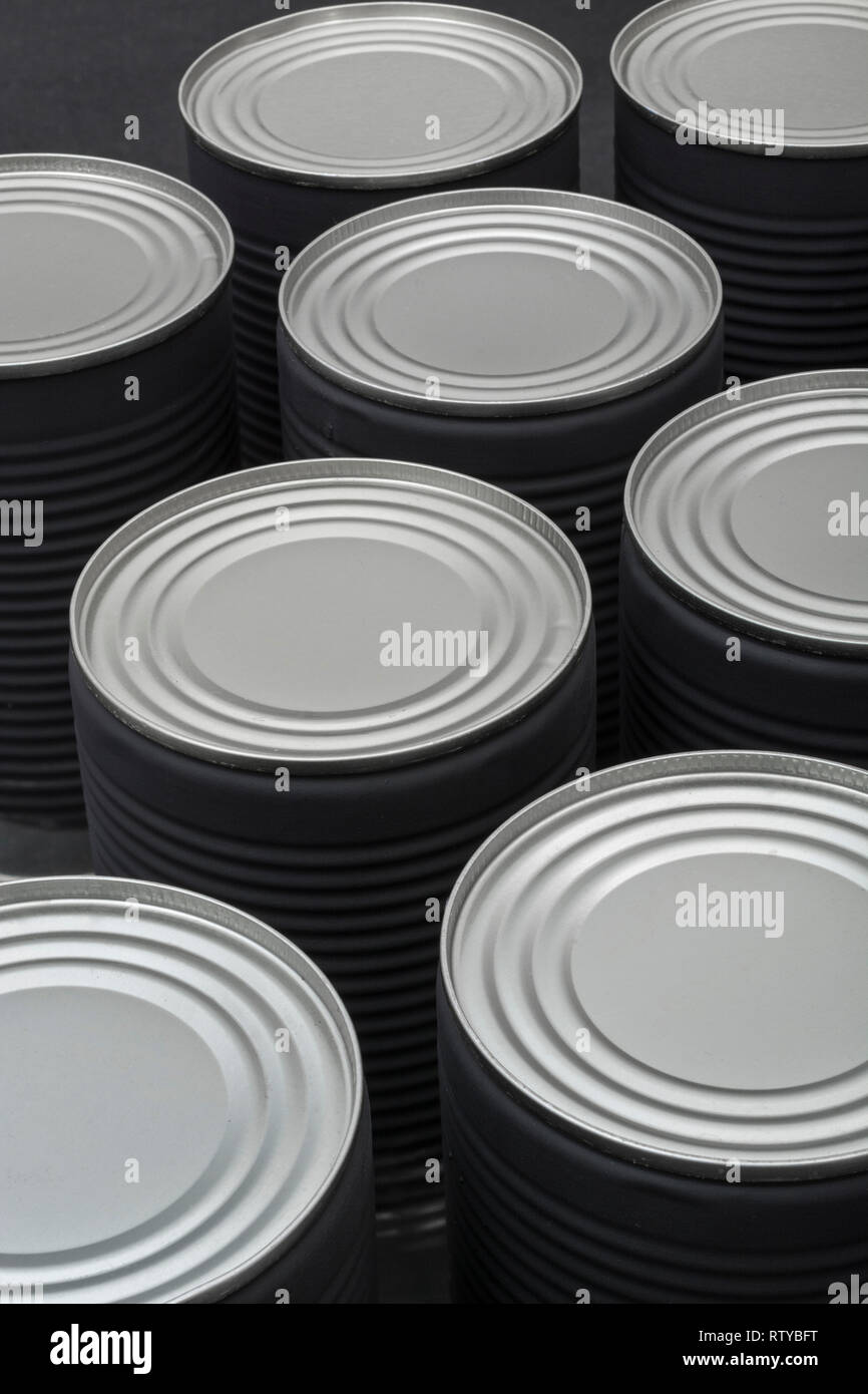 Abstract light steel food cans, tinned food. For food preservation, catering industry, food storage, Brexit stockpiling, panic buying, hoarding food. Stock Photo