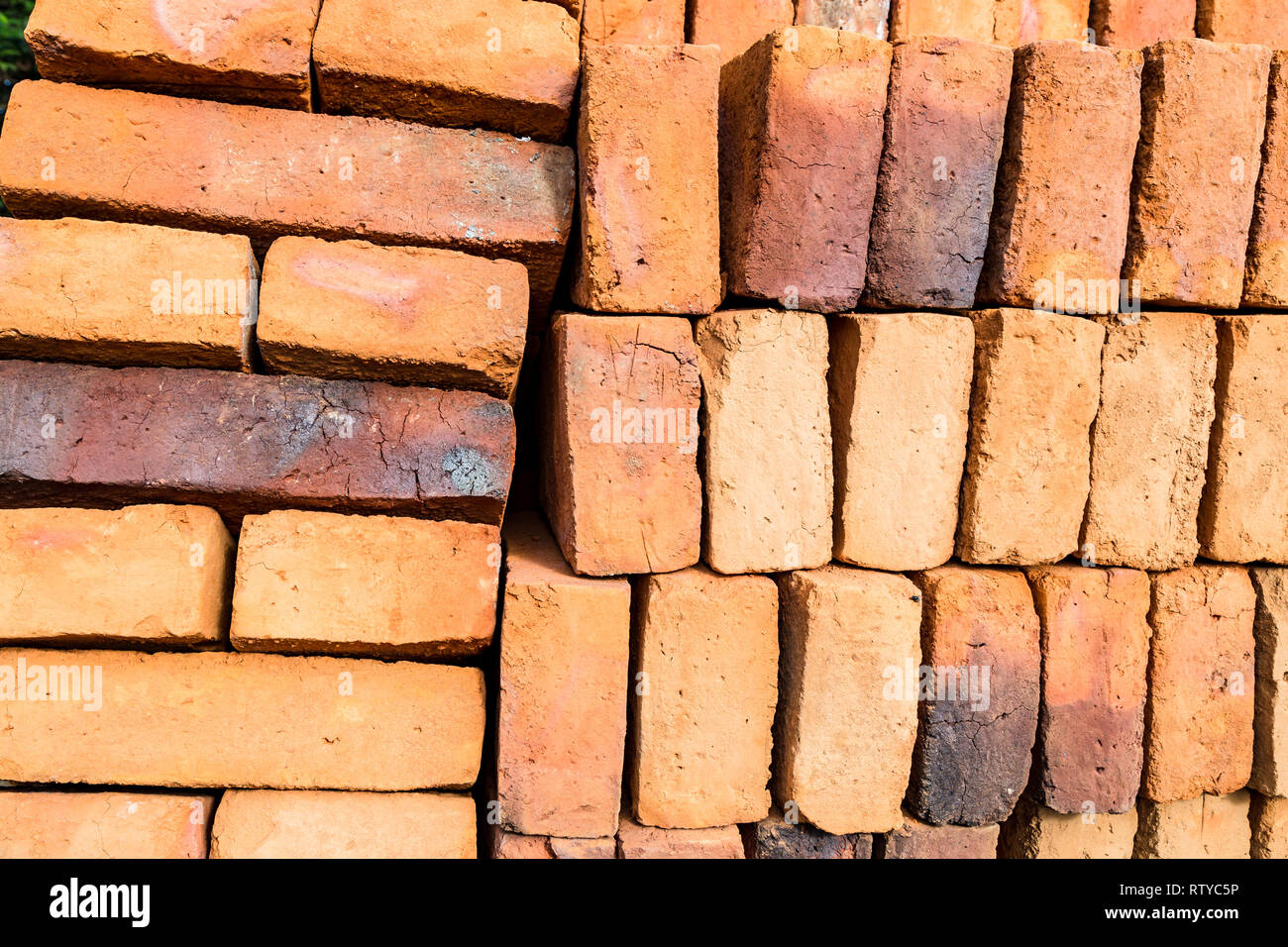 Handmade bricks, stacked for sale Stock Photo