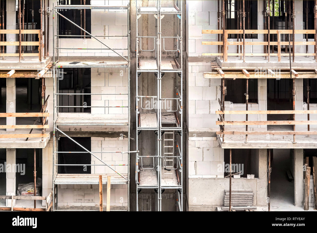 Apartment building construction site with scaffolding Stock Photo