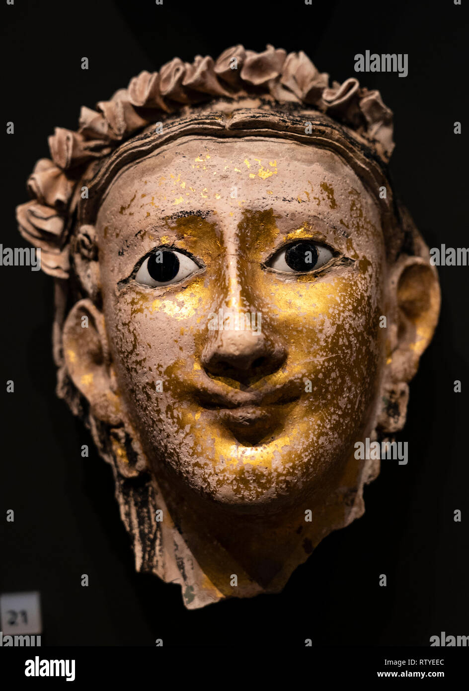 Mummy mask of a woman with plaited hair at the National Museum of Scotland in Edinburgh, Scotland, UK Stock Photo