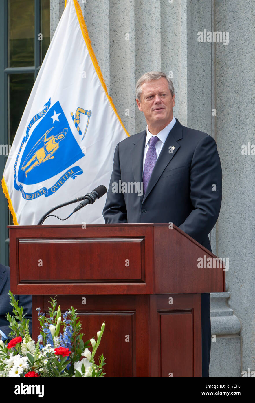 Governor Charlie Baker speaking at the opening of Hancock Adams Common in Quincy, Massachusetts. Stock Photo