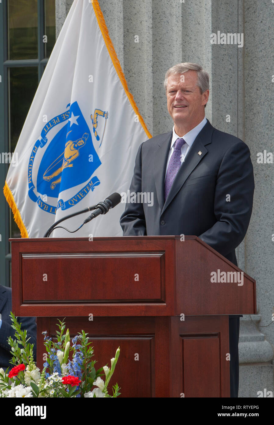 Governor Charlie Baker speaking at the opening of Hancock Adams Common in Quincy, Massachusetts. Stock Photo