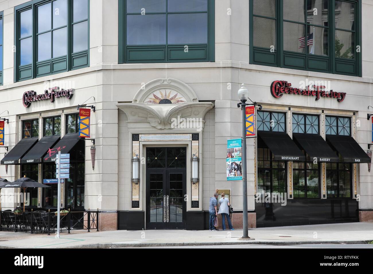 PROVIDENCE, USA JUNE 8, 2013 People walk by Cheesecake Factory