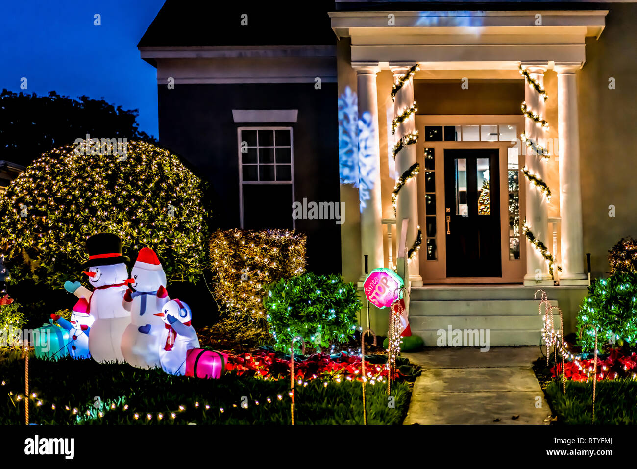 CELEBRATION, FLORIDA, USA - DECEMBER, 2018: Christmas Decorated House at Celebration City. Front House Adorned with Christmas Holiday Lights and Decor Stock Photo