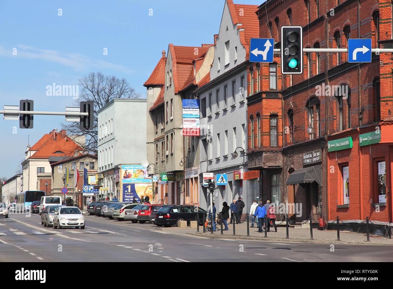 PIEKARY SLASKIE, POLAND - MARCH 9, 2015: People walk in Piekary Slaskie, Poland. Piekary Slaskie is an important city in Slaskie region. It has 54,783 Stock Photo
