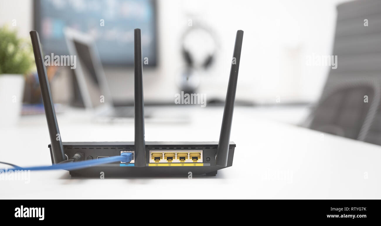 Modern dual band wireless router. Fast and wireless concept Stock Photo Alamy