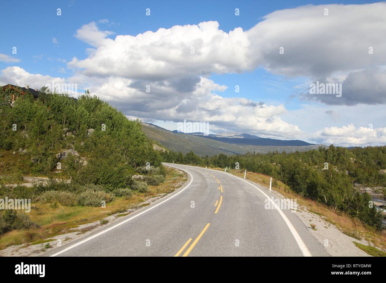 Mountain road in Norway, Oppland county. Summer landscape. Stock Photo