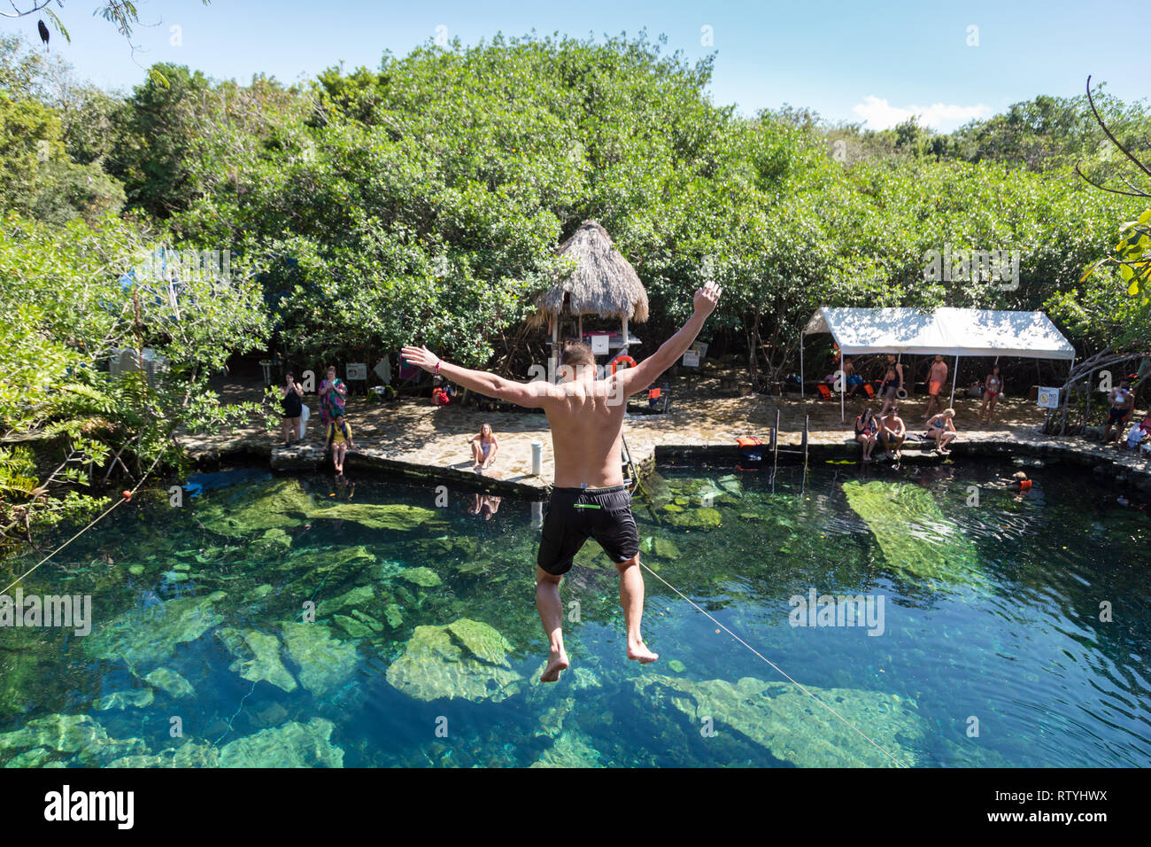 Man in jungle water hi-res stock photography and images - Alamy