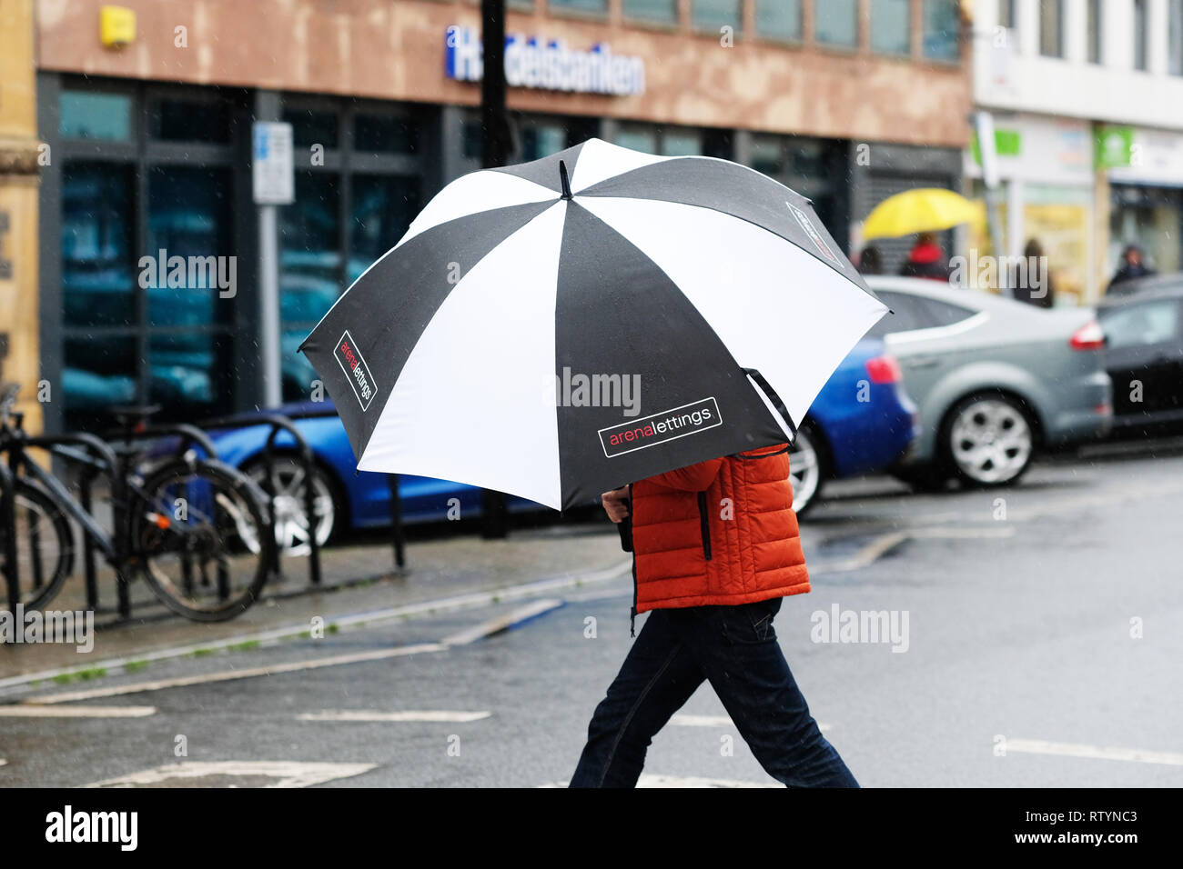 Heavy Rain Umbrella Uk High Resolution Stock Photography and Images Alamy