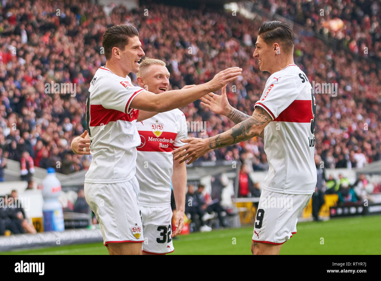 Stuttgart, Germany . 03rd Mar, 2019. Mario GOMEZ, VFB 27 celebrates his goal for  , happy, laugh, celebration, 1-0, Steven ZUBER, VFB 9 Andreas BECK, VFB 32  VFB STUTTGART - HANNOVER 96  - DFL REGULATIONS PROHIBIT ANY USE OF PHOTOGRAPHS as IMAGE SEQUENCES and/or QUASI-VIDEO -  DFL 1.German Soccer League , Stuttgart, March 3, 2019,  Season 2018/2019, matchday 24, H96 Credit: Peter Schatz/Alamy Live News Stock Photo