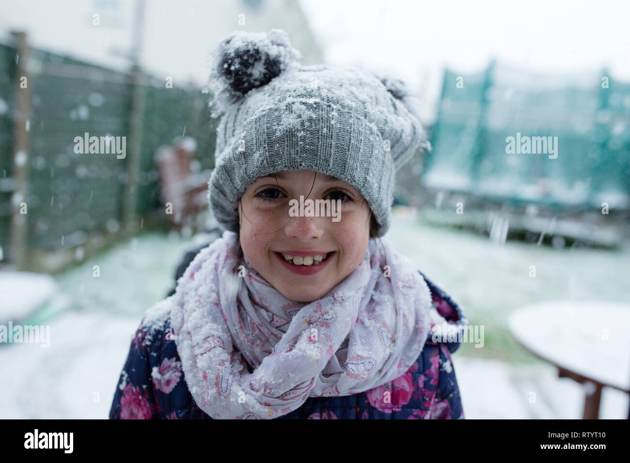 Celbridge, Kildare, Ireland. 3rd March 2019: Weather news. Exactly a year after beast from the east struck Ireland, an unexpected heavy snow fall passes through Celbridge Kildare. Kids having the most of it making snowman and enjoying playing in snow. Credit: Michael Grubka/Alamy Live News Stock Photo