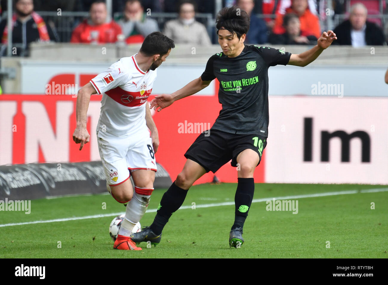 Stuttgart, Germany. 03rd Mar, 2019. Genki HARAGUCHI (Hannover96), Action, duels versus Gonzalo CASTRO (VFB Stuttgart) - Soccer 1. Bundesliga, 24.matchday, matchday24, VFB Stuttgart-Hanover 96 (H) 5-1, 03/03/2019 in Stuttgart/Germany. MERCEDES BENZ ARENA. DFL REGULATIONS PROHIBIT ANY USE OF PHOTOGRAPH AS IMAGE SEQUENCES AND/OR QUASI VIDEO. | usage worldwide Credit: dpa/Alamy Live News Stock Photo