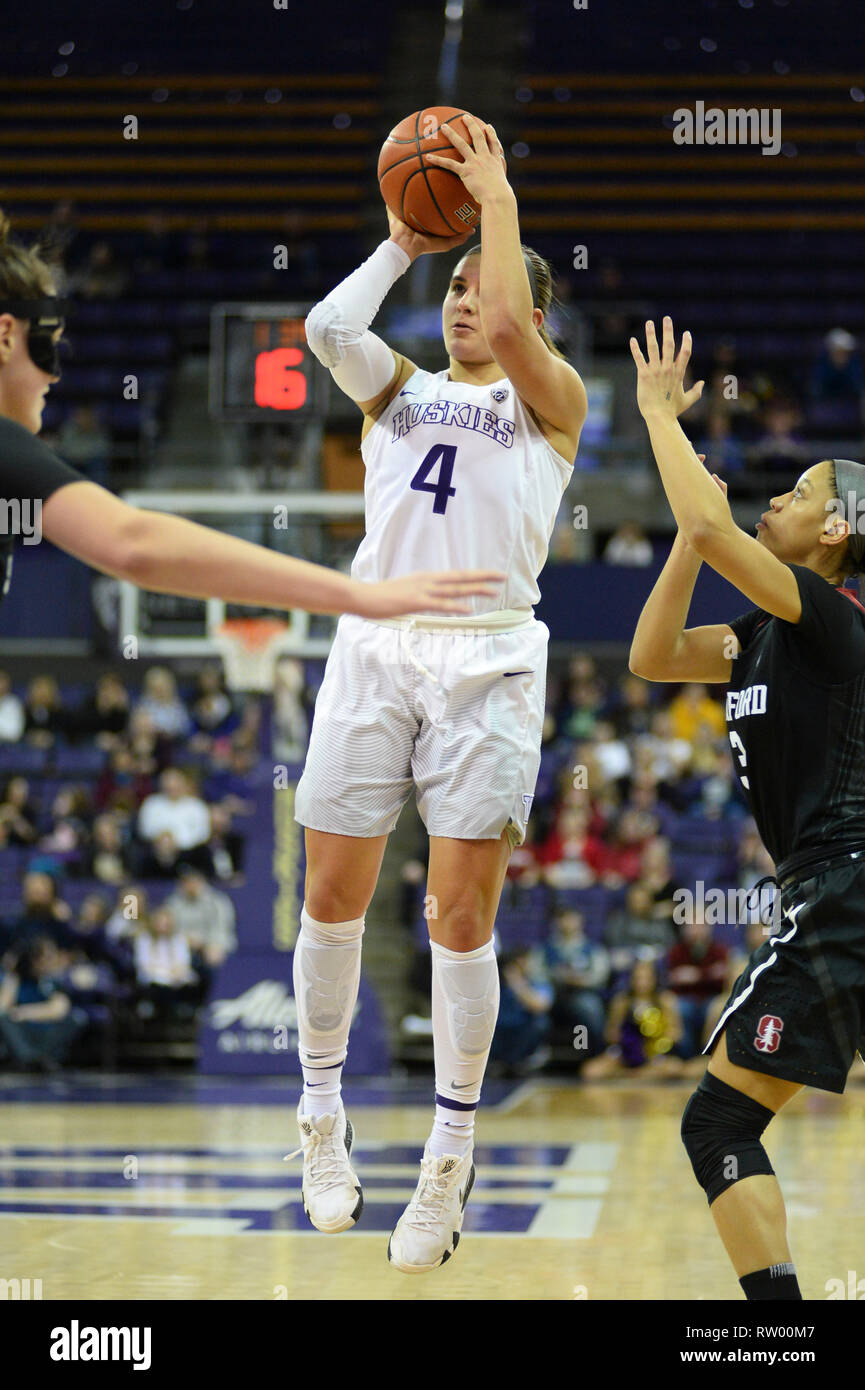 Seattle, WA, USA. 3rd Feb, 2019. UW guard AMBER MELGOZA (4) takes a 3 point shot against ANNA WILSON (3) during a PAC12 womens basketball game between the Washington Huskies and Stanford. The game was played at Hec Ed Pavilion in Seattle, WA. Jeff Halstead/CSM/Alamy Live News Stock Photo