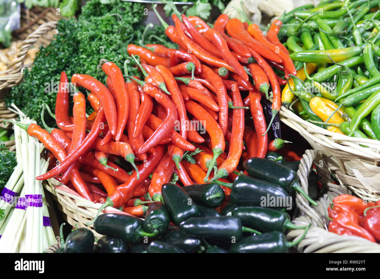 chili peppers on a market stall Stock Photo - Alamy