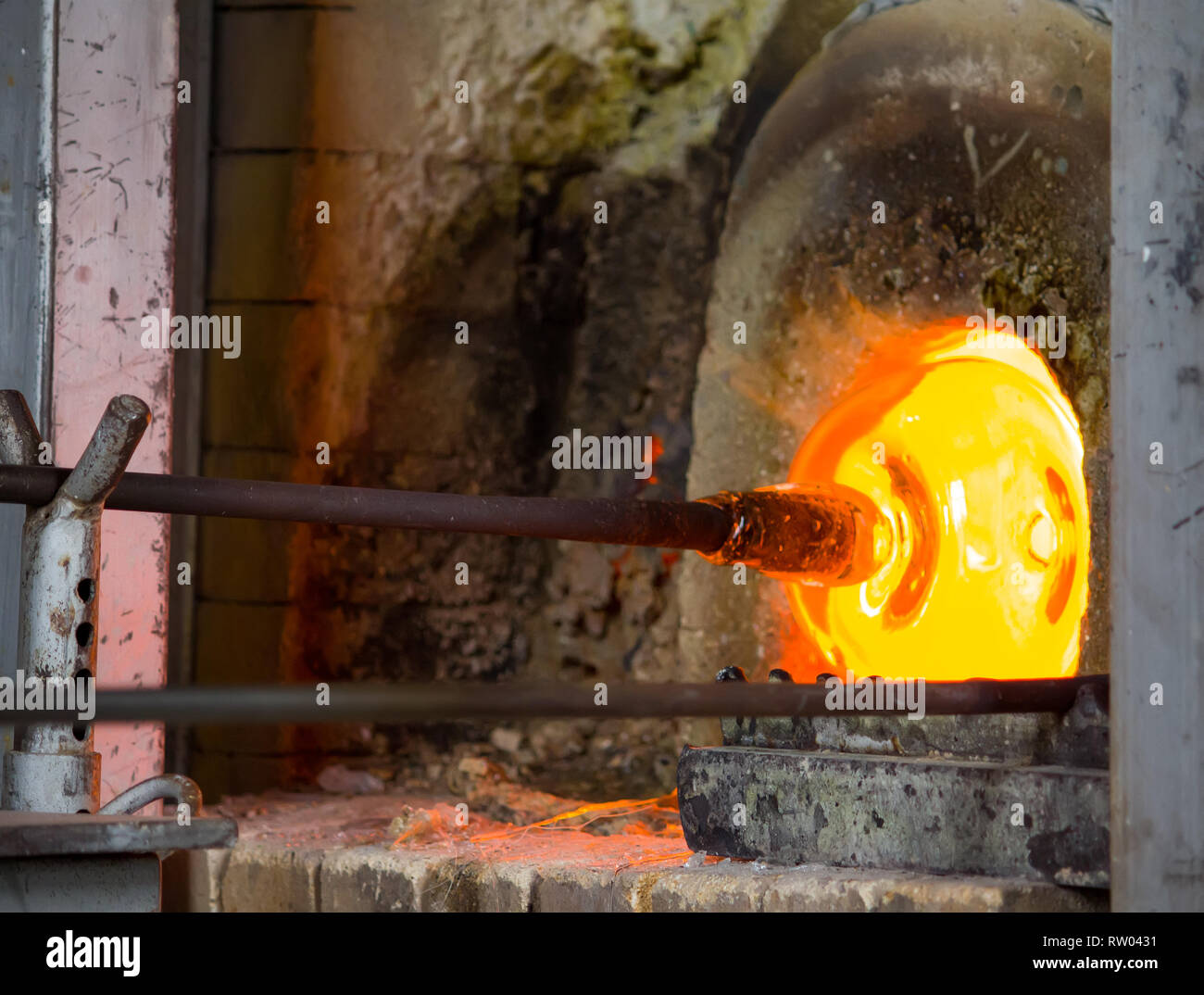 Glass blowing process in the factory Stock Photo Alamy