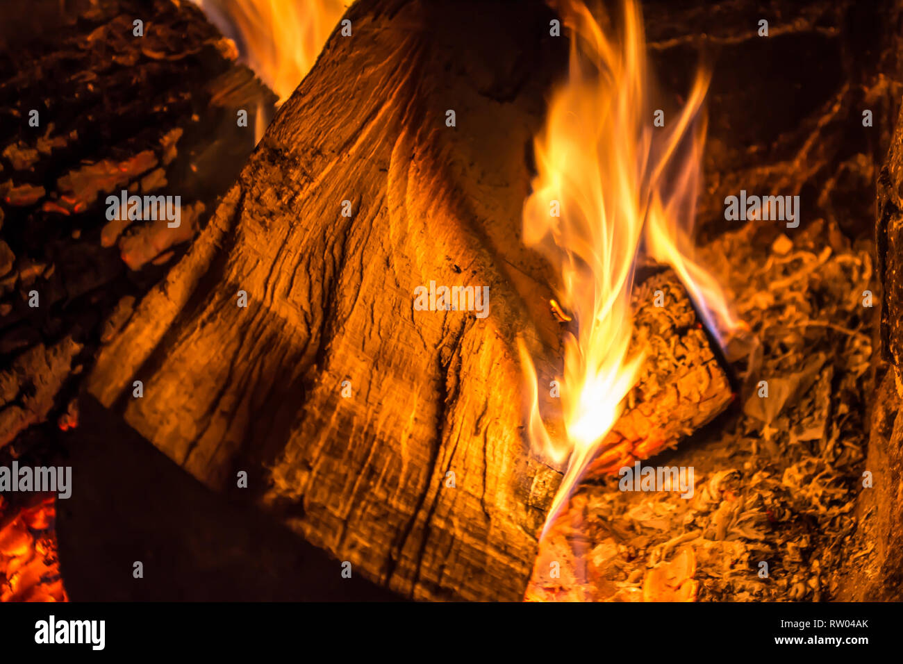 Firewood Burning In An Old Fireplace Close Up Stock Photo