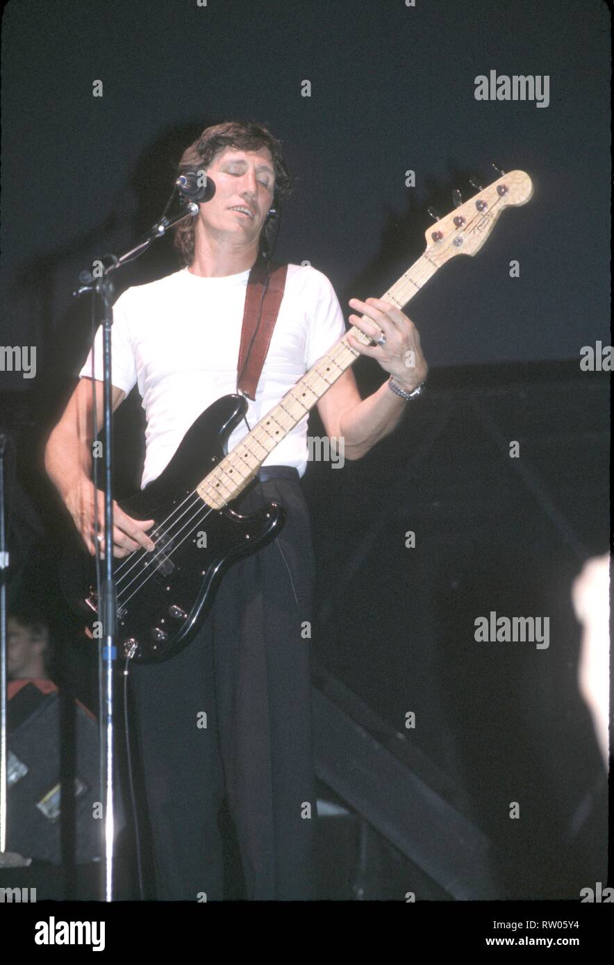 Singer, songwriter and bassist Roger Waters, best known as the bass player and one of the main songwriters in the rock band Pink Floyd, is shown performing on stage during a 'live' concert appearance. Stock Photo