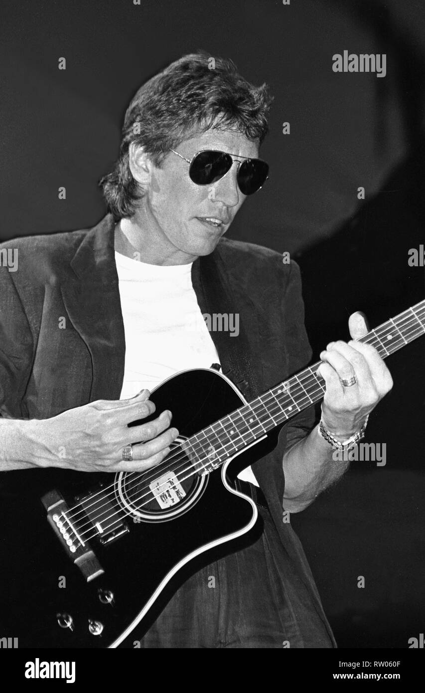 Singer, songwriter and bassist Roger Waters, best known as the bass player and one of the main songwriters in the rock band Pink Floyd, is shown performing on stage during a 'live' concert appearance with his solo band. Stock Photo
