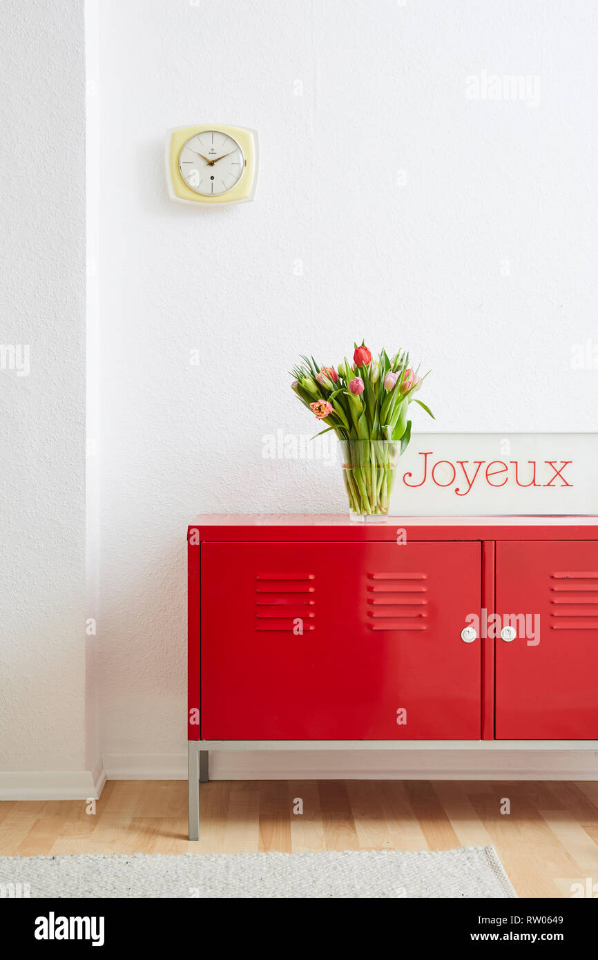 happy interior minimalist design locker with french sign and flowers Stock Photo