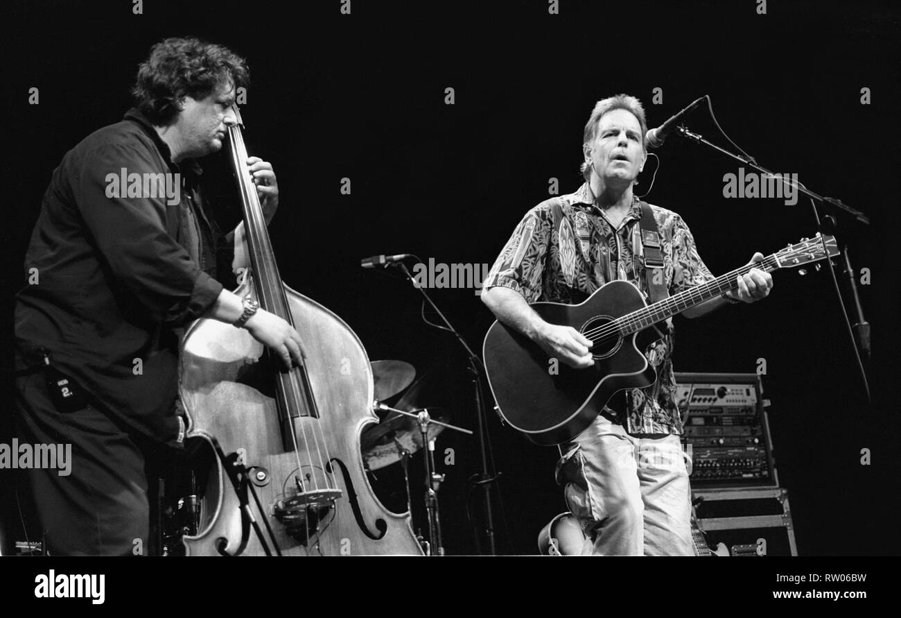 Singer, songwriter, and guitarist Bob Weir, most recognized as a founding member of the Grateful Dead, is shown performing on stage during a 'live' concert appearance. Stock Photo