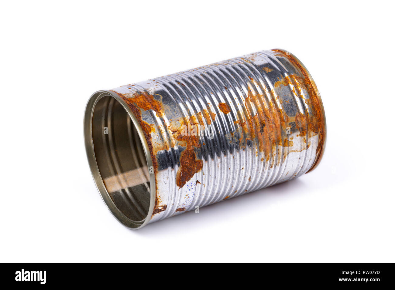 Reclining rusty tin can isolated on white background, clipping path included Stock Photo