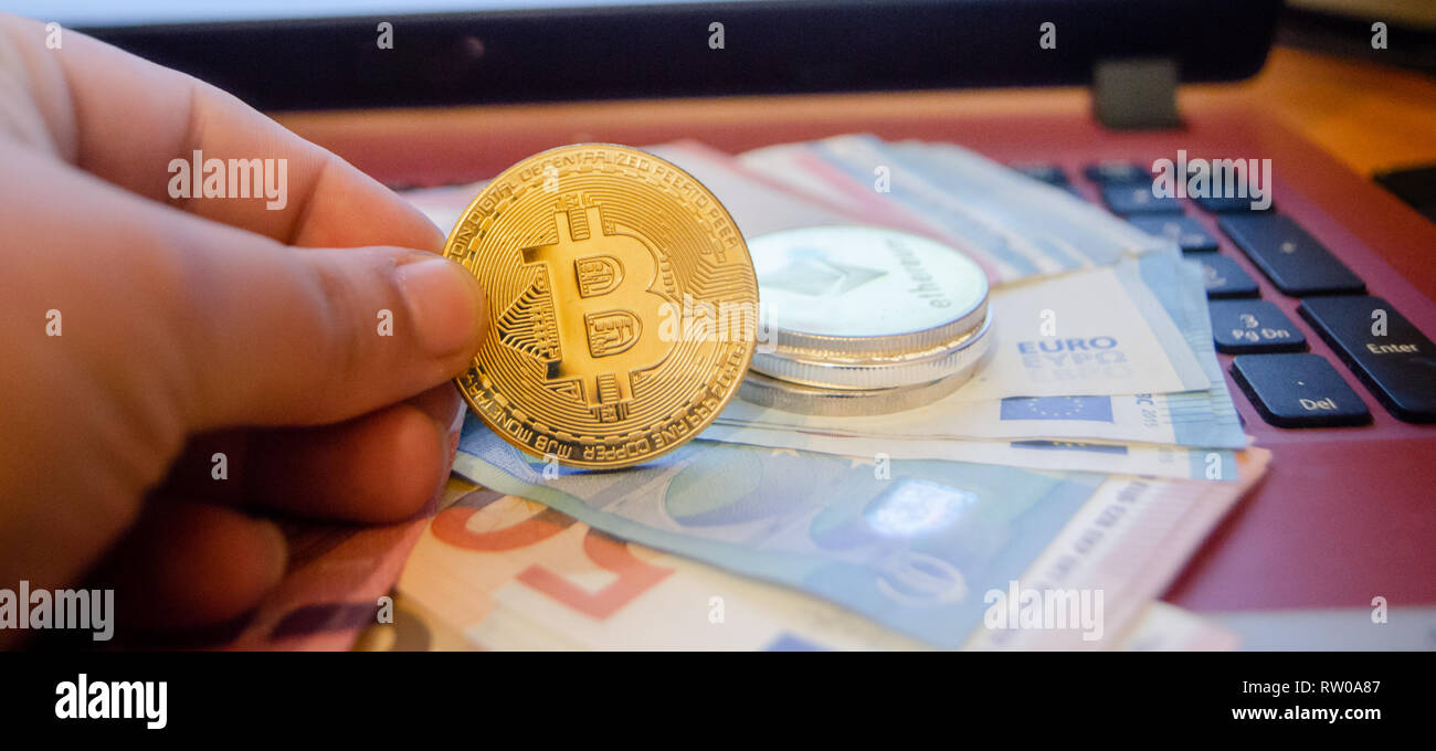 bitcoin litecoin and ethereum phisical version of virtual coins over the  euro paper money buying and seling virtual currency concept Stock Photo -  Alamy